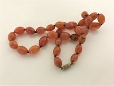 An amber type bead necklace