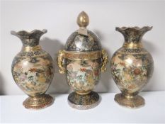 A pair of contemporary Chinese vases decorated with birds and flowers together with a matching