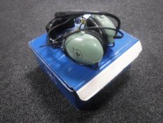 A boxed David Clark aviation headset
