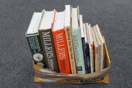 A collection of antiques reference books including Miller's and Sotheby's covering bottles,