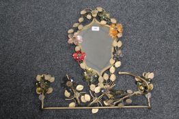 An ornate five-piece metal ware bathroom set, decorated with flowers and leaves,