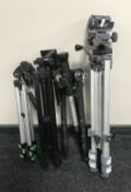 Four assorted camera tripods