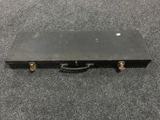 A metal shotgun case