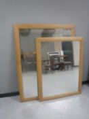 Two contemporary oak overmantel mirrors