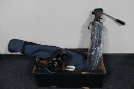 A box containing Ricoh KR-10 camera with lens, cine camera,