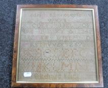A 19th century framed alphabet sampler