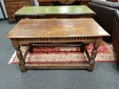 An antique carved oak table bearing date 1670,