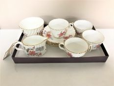 Ten pieces of antique Minton bone china with gilded detail, comprising sugar basin, milk jug,