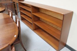 A set of mid twentieth century teak open bookshelves