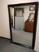 A Victorian style black framed overmantel mirror 105 cm x 167 cm