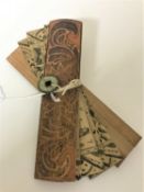 An Indian wooden prayer token