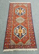 A Caucasian design runner on red ground,