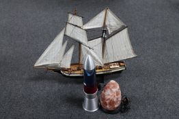 A model of a ship, L'Epervier, on stand,