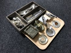 A wooden cutlery drawer containing assorted cutlery, antique brass figure of a cow with calf,