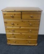 A pine five drawer chest