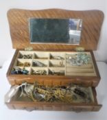 A jewellery box of assorted costume jewellery