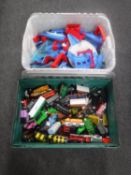 Two boxes containing a large quantity of Tomi Thomas the Tank Engine track and engines