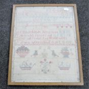 A 19th century framed alphabet sampler