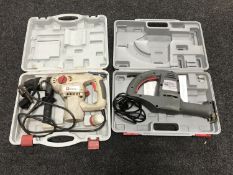 A cased Performance rotary hammer drill,