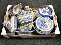 A box of antique blue and white willow pattern china including tureens, gravy boat,