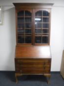 A glazed mahogany bureau bookcase