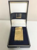 A Dunhill gold plated lighter,
