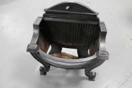 A cast iron fire grate