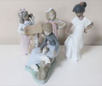 Four Nao figures of girls; girl with violin, girl with cello,