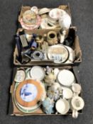 Three boxes of assorted china to include teapots, wall plates,