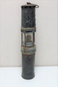 An early oversized miner's lamp