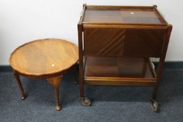 A mahogany two tier flap sided Art Deco tea trolley together with a circular walnut pie crust edge