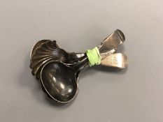 Four Georgian Newcastle silver caddy spoons CONDITION REPORT: In good condition.