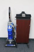 A Hoover Blaze upright vacuum together with a Corby trouser press