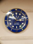 A contemporary 'Rolex' wall clock