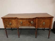 A George III inlaid mahogany bow fronted sideboard,