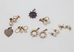Five pairs of gold mounted pearl earrings,
