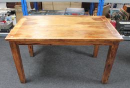 Three sheesham wood dining tables,