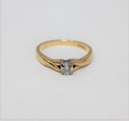 An 18ct gold diamond solitaire ring, approximately 0.2ct, size N 1/2.
