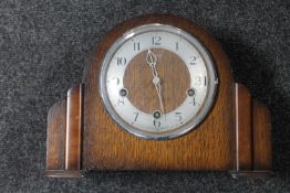 A 1930's oak Smiths Enfield mantel clock with pendulum CONDITION REPORT: There is