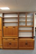A mid twentieth century G plan teak twin section display unit