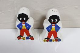 A pair of Silver Crane Golden Shred Robinson's Salt and Pepper pots