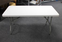 A plastic banqueting table
