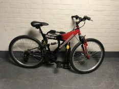 A Silver Fox full suspension mountain bike together with a car bike rack