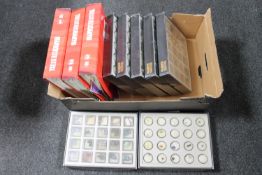 A box of three Treasures of the World files containing magazines, display cases of rock samples.