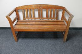 A teak garden bench