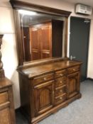 A Ducal Pine mirror backed sideboard,