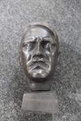 A cast iron bust of Hitler