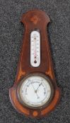 A Victorian inlaid mahogany barometer