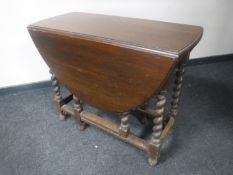 An oak barley twist gateleg table