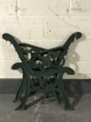 A pair of cast iron bench ends